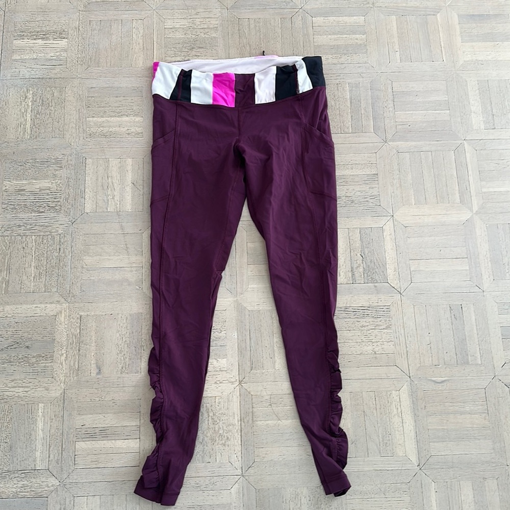 Lululemon burgandy leggings full length. Ruched detail. Great condition! Size 8